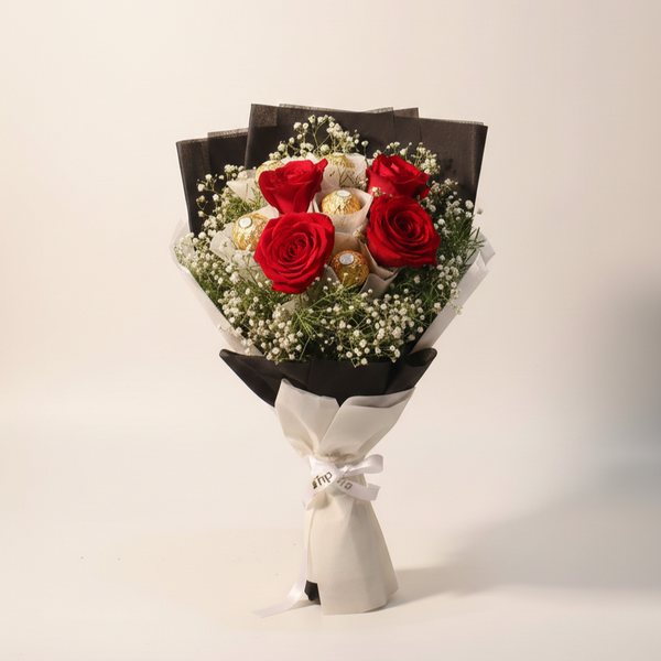 Eleganter Dunkler Ritter – Blumenstrauß mit roten Rosen und Ferrero Rocher – Amores