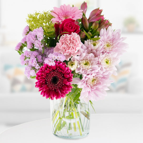 Fruchtige Brise - Rosa Gerbera, Chrysanthemen und Statice in lebendiger Vielfalt