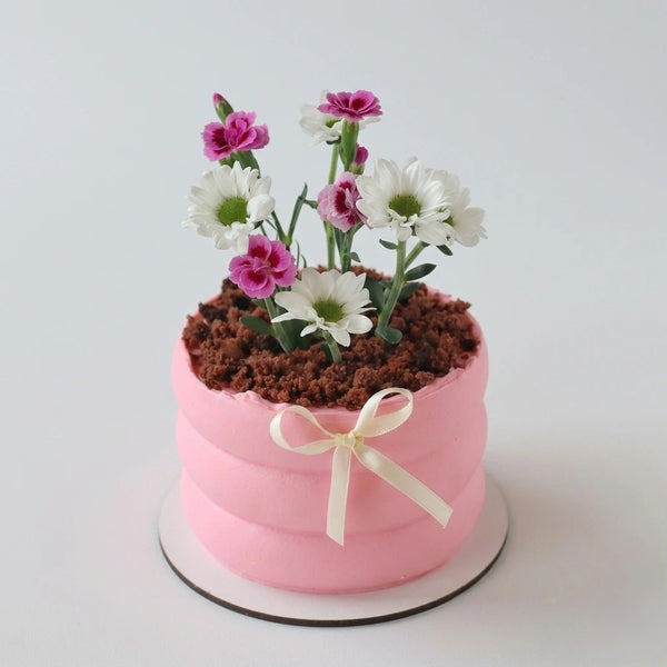 Handgefertigte Garten-Idyll Torte zum Muttertag – frisch auf Bestellung, Lieferung in Linz.