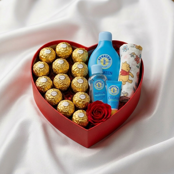 Goldene Momente Baby Geschenkset – Rote Herzbox mit roter Rose, Ferrero Rocher, Babypflege & Unterwäsche, Same-Day-Lieferung Linz | Amores